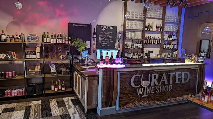 CURATED WINE SHOP paint and sip