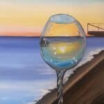 glass of sunset wine and paint